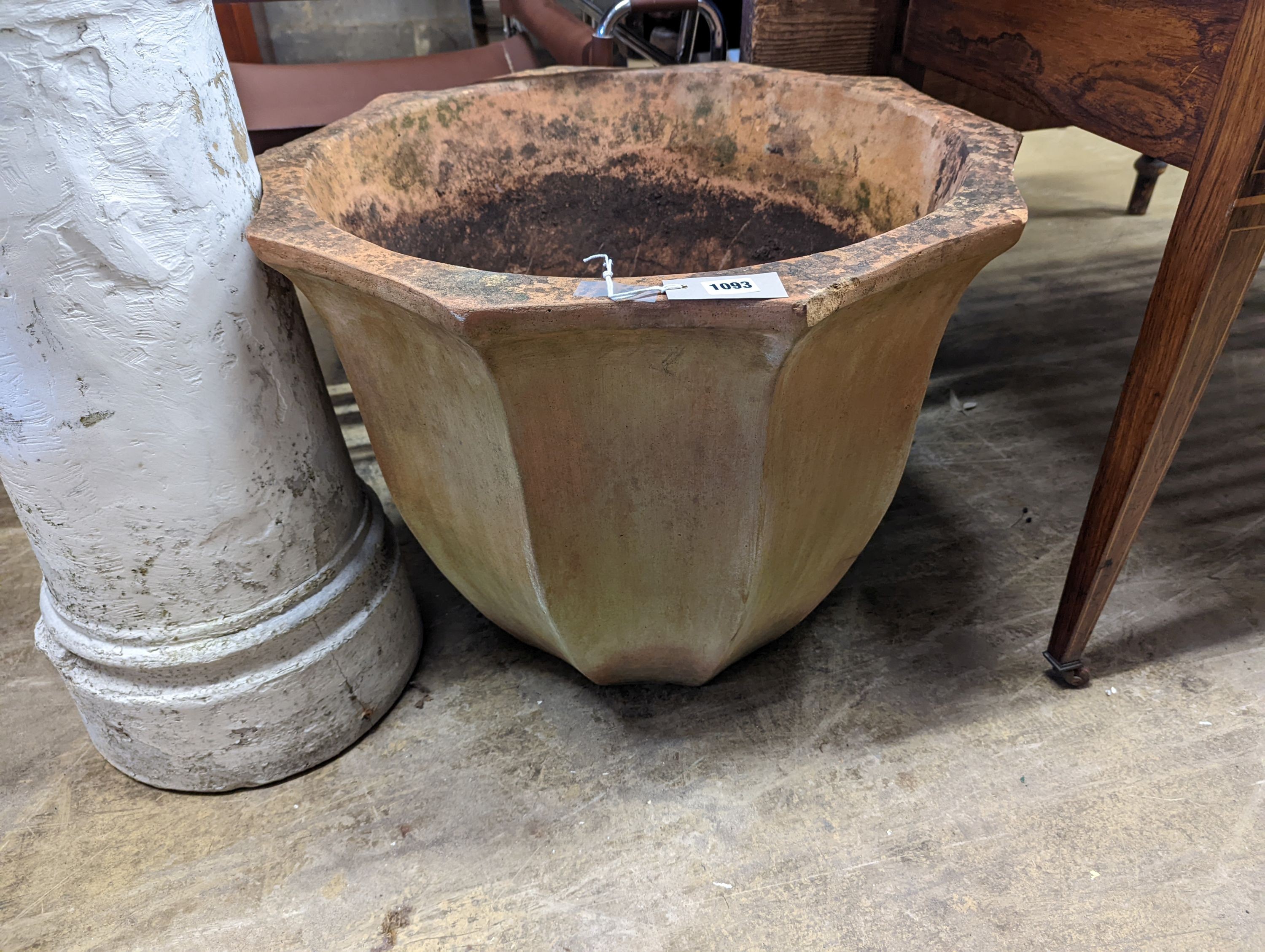 A large shaped circular terracotta garden planter, diameter 66cm, height 52cm